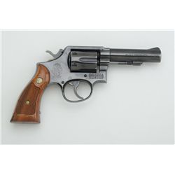 Smith & Wesson Model 10-6 DA revolver, .38  S&W Special cal., 4” heavy barrel, blue  finish, checker