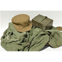 Lot of military gear including 2 gas masks, a  hat, an M1 carbine boot, laundry bag and a  sea bag. 