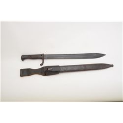 German bayonet and metal scabbard with  leather hanger; bayonet is overall good,  scabbard shows sca