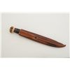 Image 2 : Knife and leather sheath; knife is approx.  10-1/2” overall with a 6” blade and stacked  leather gri