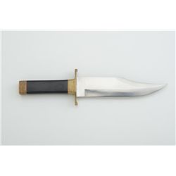 Unmarked modern clip point knife approx.  11-1/2” overall with a 7” blade in like new  condition.  E