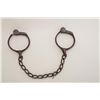 Image 2 : Bean leg irons with key, working at time of  description, dark patina, circa 1880-90’s.  From an old