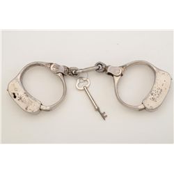 Bean Patrolman handcuffs, nickel plated with  key, working at time of description, in  overall very 