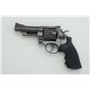 Image 2 : Smith & Wesson Model 25-9 DA revolver, .45  Colt cal., 4” barrel, blue finish, Hogue  stippled finge