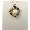Image 2 : Graceful 10 karat two-tone gold ladies heart  design pendant set with a center opal and  fine diamon