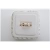 Image 1 : One diamond band in 14k yellow gold set with  9 round diamonds weighing approx. 0.60ct.  gold 4.4gm 