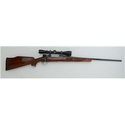 Husqvarna bolt action rifle, .270 Win. cal.,  24” barrel, blue finish, checkered deluxe  wood stock 