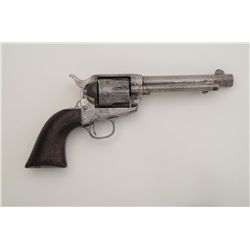 Colt SAA revolver, .45 cal., 5-1/2” barrel,  wood grips, nickel finish, #97412. This gun  is in over