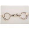 Image 1 : Tower Bean’s handcuffs, nickel finish, with  key, each cuff stamped “HUNTER”, in overall  good condi