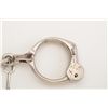 Image 2 : Tower Bean’s handcuffs, nickel finish, with  key, each cuff stamped “HUNTER”, in overall  good condi