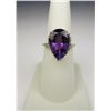 Image 1 : Colorful 10 karat yellow gold ladies ring set  with a large pear shape Amethyst weighing  approx. 7.