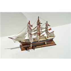 Ceramic Cutty Sark sailing ship advertiser,  approx.  16” long  x  11” in height  x  7”  wide on woo