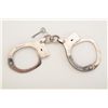 Clejuso  standard weight modified swivel  handcuffs, nickel plated with key, working at  time of des