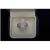 Exquisite 14 karat white and rose gold flower  design ring bead set with 32 round diamonds  weighing