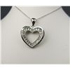 Elegant 10 karat white gold ladies heart  shape vintage style pendant bead set with 24  round diamon