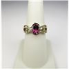 Image 1 : Elegant 10 karat yellow gold ladies ring set  with an oval pink tourmaline weighing approx.  2.00 ca