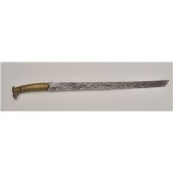 Revolutionary War era short sword with cast  brass grip and 17” blade in near relic  condition.  Est