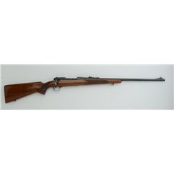 Winchester Model 70 bolt action rifle, .30-06  Spfld cal., 24” barrel, blue finish,  checkered wood 