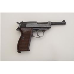 German P-38 DA semi-auto pistol, 9mm cal.,  4-3/4” barrel, military finish, ac 44 marked,  maroon gr