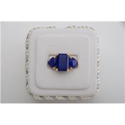 One yellow gold unique ladies ring set with 3  facetted lapis stones. Est.: $500-$1,000.