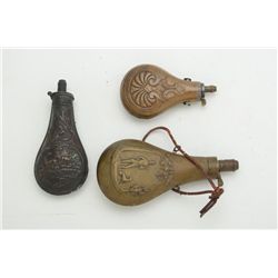 Collection of 10 mid-19th century shotgun  flasks.   Est.:  $300-$600.