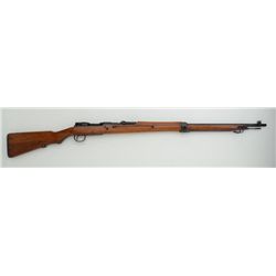 Japanese Arisaka bolt action rifle, 8mm cal.,  #20591 in overall very good condition  showing consid