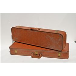 Lot of two Browning luggage style hard case  in overall good condition.  Est.:  $300-$500.