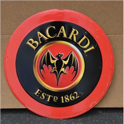 Metal Bacardi advertising sign approx. 18” in  diameter in overall good condition.    Est.:   $50-$1