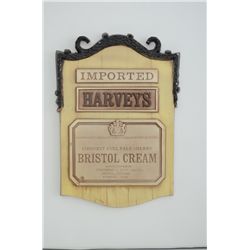 Cast advertiser sign for Imported Harveys  Bristol Cream approx. 15” x 10”.  Est.:   $50-$100.