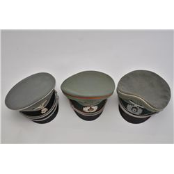 Lot of 3 German nazi military hats including  an Infantry cap, an Artillery cap and an SS  visor cap