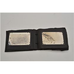 Photo album of Ed H. Seltenreich, U.S.N.  circa 1919-1922, with original black and  white prints of 