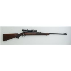 Winchester Model 70 bolt action rifle, .30  Gov’t ’06 cal., 24” barrel, blue finish, hand  checkered