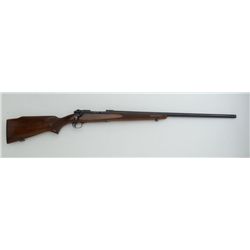 Winchester Model 70 bolt action rifle, .220  Swift cal., 26” barrel, mat black finish,  checkered wo