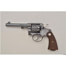 Colt New Service DA revolver, .45 Colt cal.,  5-1/2” barrel, blue finish, checkered wood  medallion 