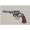 Image 1 : Colt New Service DA revolver, .45 Colt cal.,  5-1/2” barrel, blue finish, checkered wood  medallion 