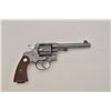 Image 2 : Colt New Service DA revolver, .45 Colt cal.,  5-1/2” barrel, blue finish, checkered wood  medallion 