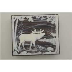 “Incoloy” cast stone recomposition box with  fancy elk scene on top and lined for two Colt  New Seri