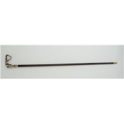 Art Nouveaux walking stick with silver  “ribbon” style grip and hardwood possibly  rosewood shaft. M