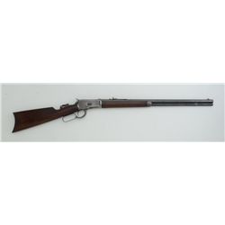 Winchester Model 1892 lever action rifle, .38  W.C.F. cal., 24” octagon barrel, blue  finish, wood s