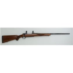 Ruger Model 77 bolt action rifle, .338 Win.  Mag. cal., 24” barrel, blue finish, checkered  wood sto