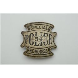 Special Police #54, Kansas City, MO, 1922  badge in good condition with heavy patina.   Est.:  $150-