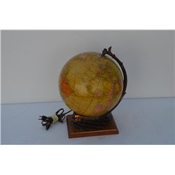 World globe, approx. 10” in diameter, on wood  base with copper support, circa 1940’s in  overall go