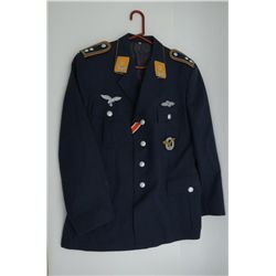 Lot of 2 German repro.  uniform jackets, one  grey, the other navy blue.  Est.:  $75-$125.