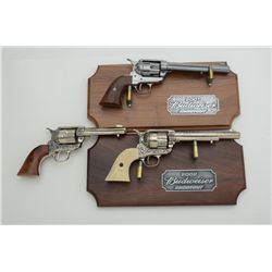 Lot of 3 decorator non-guns, one an engraved  facsimile of a Colt SAA in cardboard box;  another fac