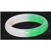 Image 1 : CHINESE GREEN AND WHITE JADE BANGLE; DIAMETER 2.5 IN