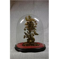 A Victorian Brass Skelton Clock Under a Glass Dome with Fusee Movement....