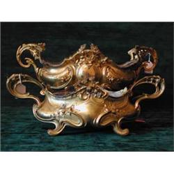 Two similar late 19th century French gilt metal shaped oval planters with...