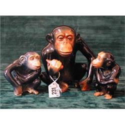 A group of three Sylvac chimpanzees - large and two smaller...