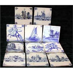 A collection of eleven Delft blue and white tiles...