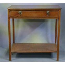 A 19th Century mahogany side table fitted a drawer with brass lion mask ring handles, raised on s...